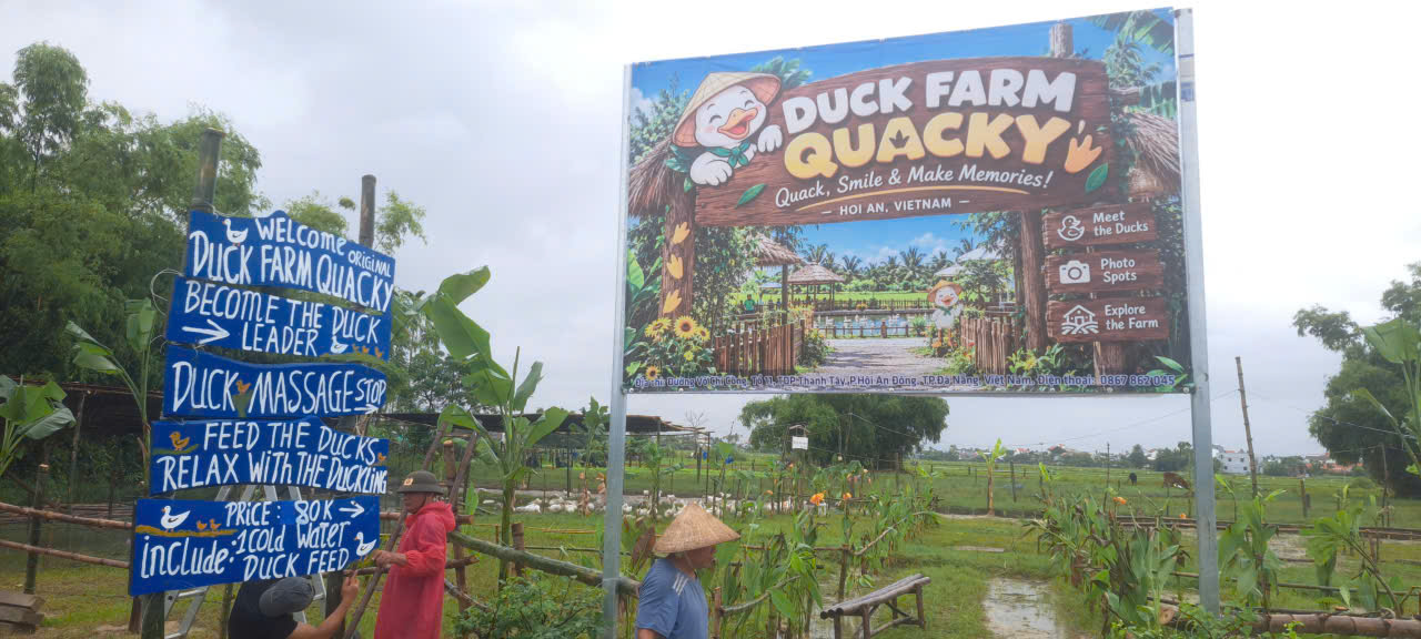 Hand-painted welcome board at the farm